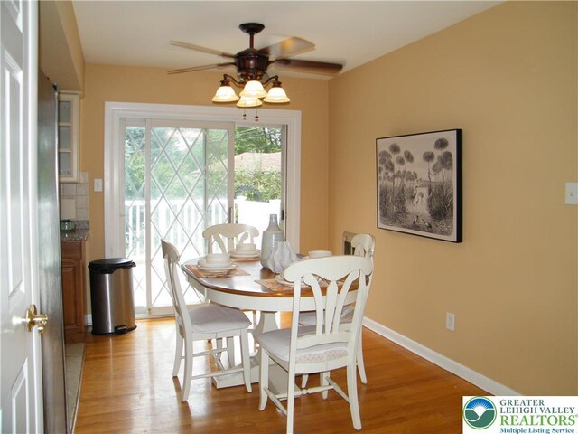 3415 Kathleen Ave, Salisbury Twp, PA 18103 - dining room with a ceiling fan and light wood-style flooring