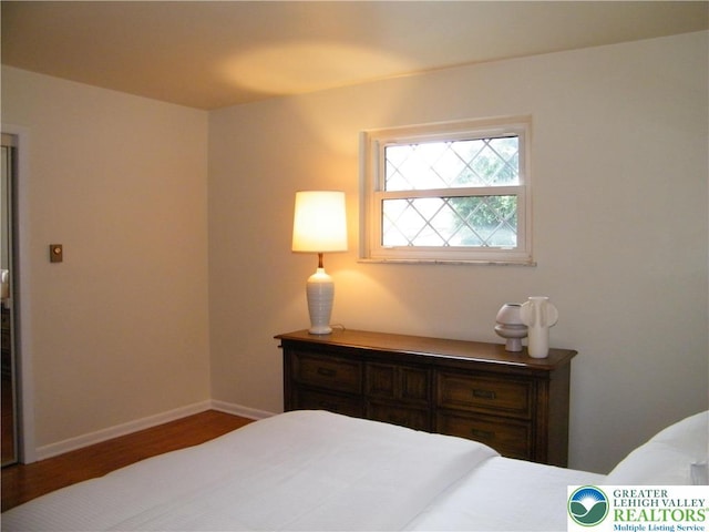 3415 Kathleen Ave, Salisbury Twp, PA 18103 - bedroom with wood finished floors and baseboards