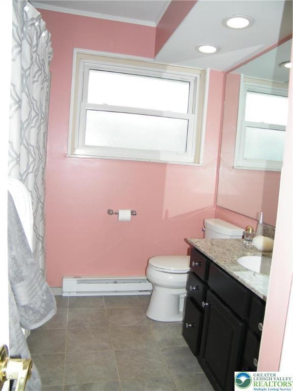 3415 Kathleen Ave, Salisbury Twp, PA 18103 - bathroom with plenty of natural light, vanity, a baseboard heating unit, and ornamental molding