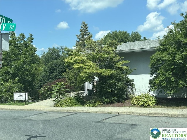 3300 Quarry St Unit B4, Whitehall Twp, PA 18052 - view of side of property featuring stucco siding