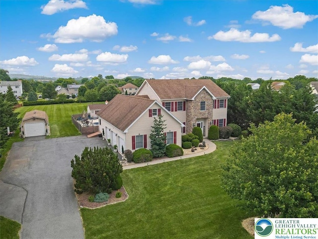 2804 Lehigh Ln, Upper Nazareth Twp, PA 18064 - colonial inspired home featuring a garage, a front lawn, and asphalt driveway