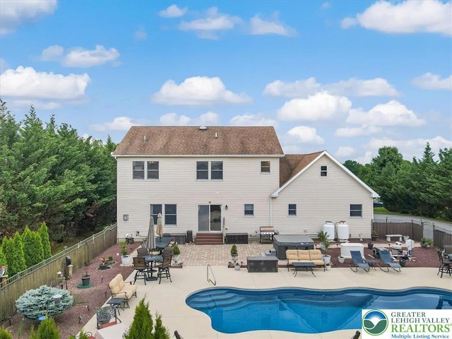 2804 Lehigh Ln, Upper Nazareth Twp, PA 18064 - back of house featuring a patio, a fenced backyard, a jacuzzi, and entry steps