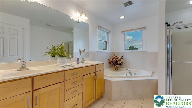 2804 Lehigh Ln, Upper Nazareth Twp, PA 18064 - full bathroom with double vanity, tile patterned flooring, a bath, and a stall shower