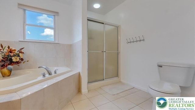 2804 Lehigh Ln, Upper Nazareth Twp, PA 18064 - bathroom featuring a garden tub, a shower stall, and tile patterned flooring