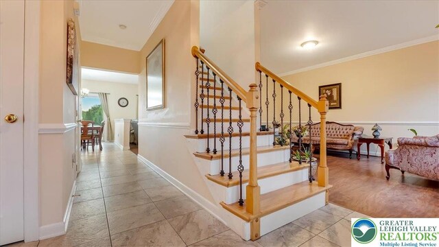 2804 Lehigh Ln, Upper Nazareth Twp, PA 18064 - stairway with crown molding and tile patterned floors