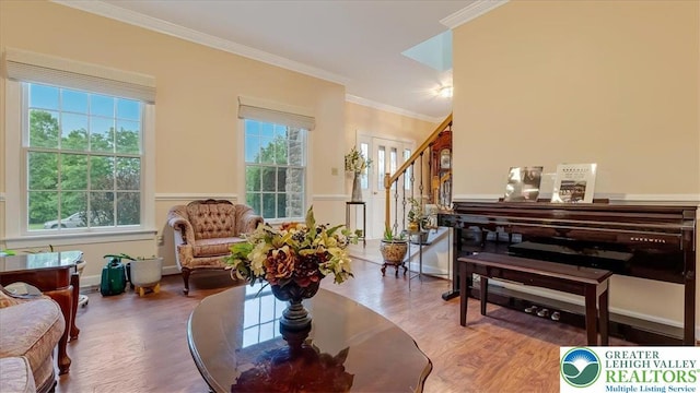 2804 Lehigh Ln, Upper Nazareth Twp, PA 18064 - living area with wood finished floors, crown molding, and stairs