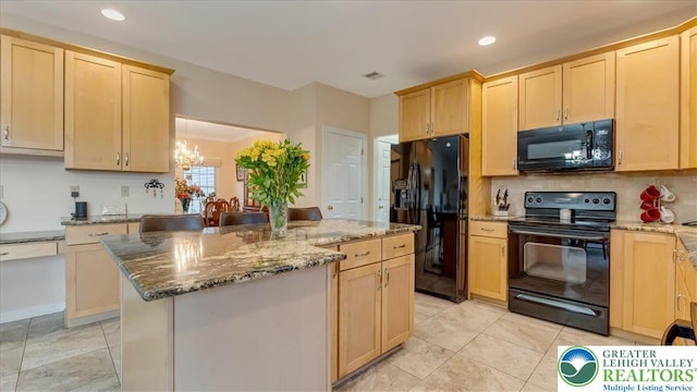 2804 Lehigh Ln, Upper Nazareth Twp, PA 18064 - kitchen with black appliances, light brown cabinetry, stone countertops, tasteful backsplash, and recessed lighting