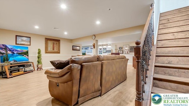 2804 Lehigh Ln, Upper Nazareth Twp, PA 18064 - living area with stairs, light wood-style floors, and recessed lighting