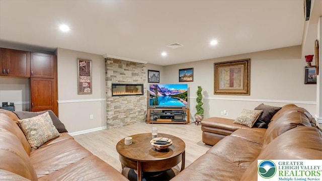 2804 Lehigh Ln, Upper Nazareth Twp, PA 18064 - living area with wood finished floors, recessed lighting, and a fireplace