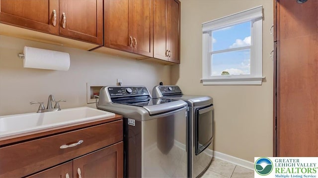 2804 Lehigh Ln, Upper Nazareth Twp, PA 18064 - laundry room featuring cabinet space, independent washer and dryer, and light tile patterned floors