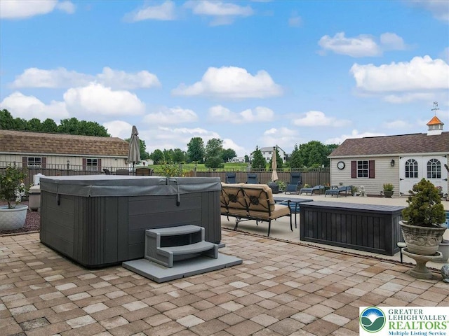 2804 Lehigh Ln, Upper Nazareth Twp, PA 18064 - fenced backyard featuring a hot tub, a patio, and an outdoor structure