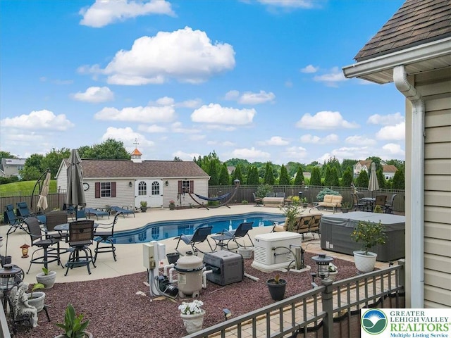 2804 Lehigh Ln, Upper Nazareth Twp, PA 18064 - view of pool with a patio, an outdoor structure, a fenced backyard, and a storage structure