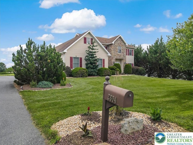 2804 Lehigh Ln, Upper Nazareth Twp, PA 18064 - traditional-style home with a front yard and stone siding