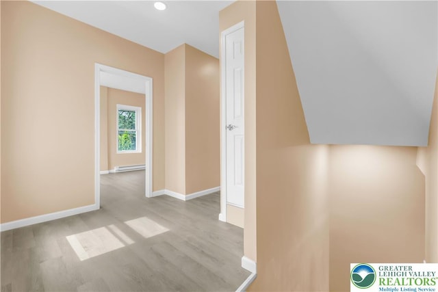 5734 Rte 873, North Whitehall Twp, PA 18078 - hallway featuring a baseboard radiator, wood finished floors, and recessed lighting