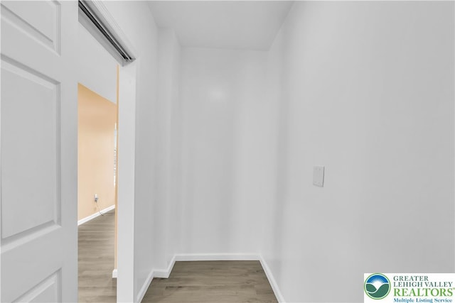 5734 Rte 873, North Whitehall Twp, PA 18078 - corridor with wood finished floors and a wall unit AC