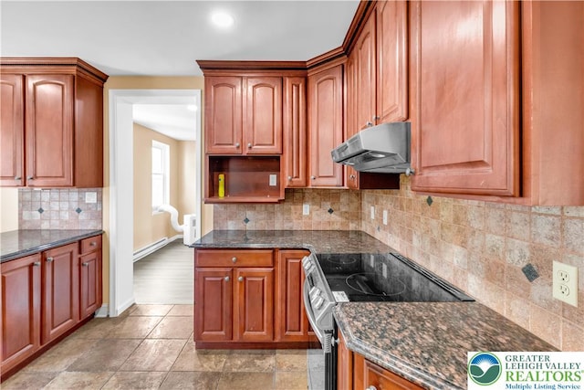 5734 Rte 873, North Whitehall Twp, PA 18078 - kitchen with stainless steel electric range, under cabinet range hood, dark stone countertops, decorative backsplash, and recessed lighting