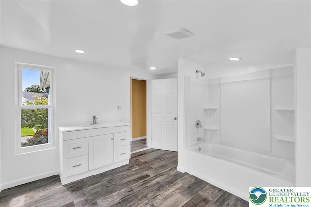 5734 Rte 873, North Whitehall Twp, PA 18078 - full bathroom featuring shower / bathtub combination, vanity, wood finished floors, and recessed lighting