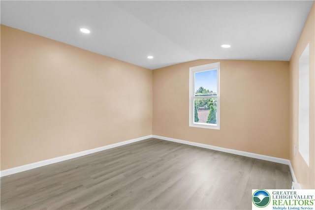 5734 Rte 873, North Whitehall Twp, PA 18078 - spare room featuring wood finished floors, recessed lighting, and vaulted ceiling