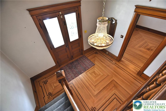 107 N Schanck Ave, Pen Argyl Boro, PA 18072 - entrance foyer with stairway and a chandelier