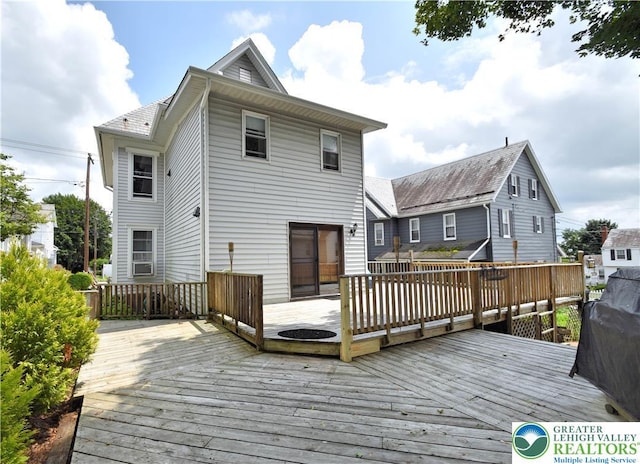 107 N Schanck Ave, Pen Argyl Boro, PA 18072 - rear view of property featuring a deck