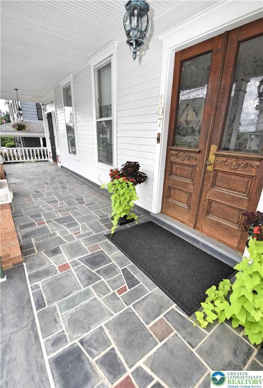 107 N Schanck Ave, Pen Argyl Boro, PA 18072 - view of exterior entry featuring a porch
