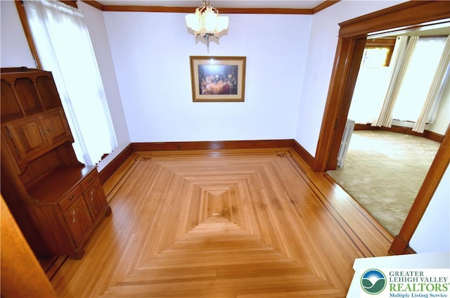 107 N Schanck Ave, Pen Argyl Boro, PA 18072 - empty room featuring a chandelier and ornamental molding