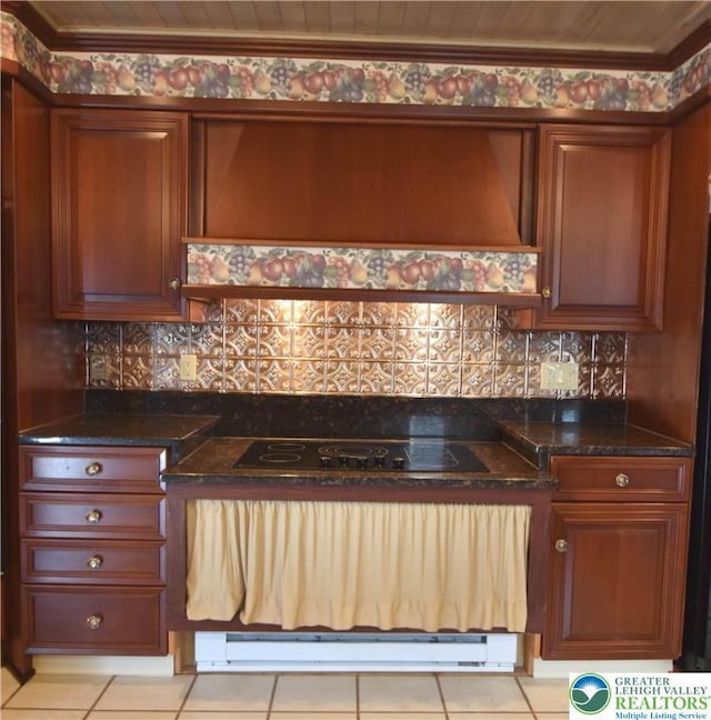107 N Schanck Ave, Pen Argyl Boro, PA 18072 - kitchen featuring black electric stovetop, a baseboard heating unit, tasteful backsplash, and light tile patterned flooring