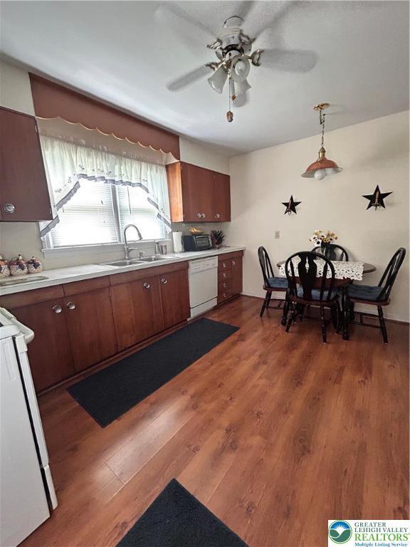 2653 Woodlawn Ave, Palmer Twp, PA 18045 - kitchen with a ceiling fan, wood finished floors, light countertops, and range