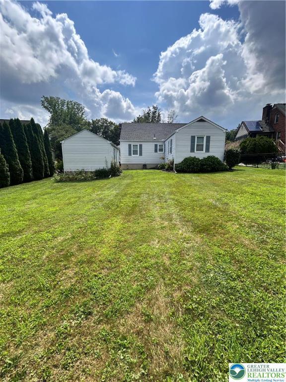 2653 Woodlawn Ave, Palmer Twp, PA 18045 - back of house with a yard