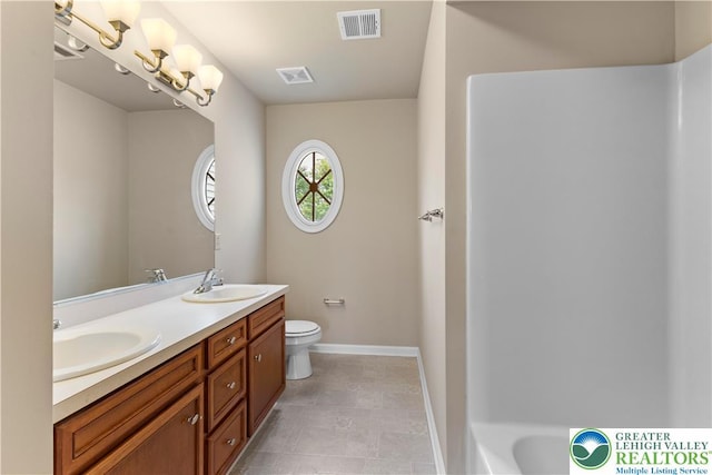 9 Stone Crk, Palmer Twp, PA 18045 - bathroom featuring double vanity and toilet