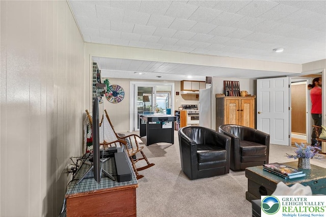 56 Hearthstone Dr, Exeter Twp, PA 19606 - living area featuring light carpet and wood walls
