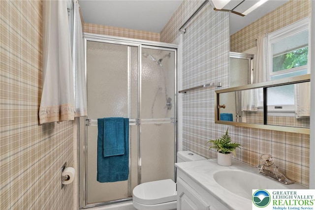 56 Hearthstone Dr, Exeter Twp, PA 19606 - bathroom featuring tile walls, vanity, and a shower stall