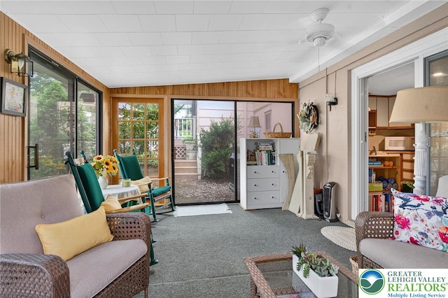 56 Hearthstone Dr, Exeter Twp, PA 19606 - sunroom featuring carpet flooring, wooden walls, and vaulted ceiling
