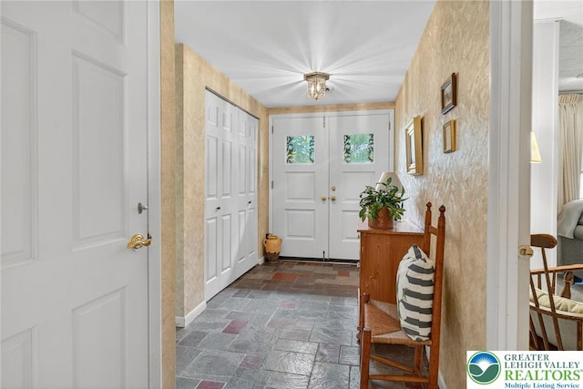 56 Hearthstone Dr, Exeter Twp, PA 19606 - foyer with stone tile flooring