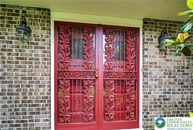 56 Hearthstone Dr, Exeter Twp, PA 19606 - doorway to property with brick siding