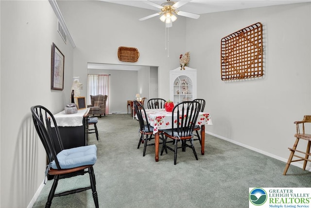 56 Hearthstone Dr, Exeter Twp, PA 19606 - dining room with carpet floors, ceiling fan, and high vaulted ceiling