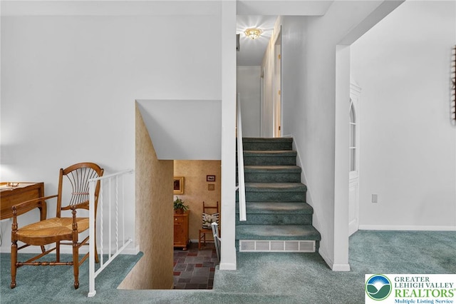 56 Hearthstone Dr, Exeter Twp, PA 19606 - staircase featuring carpet and baseboards
