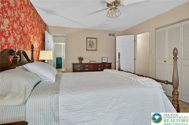 56 Hearthstone Dr, Exeter Twp, PA 19606 - carpeted bedroom with wallpapered walls, a closet, ceiling fan, and ensuite bathroom