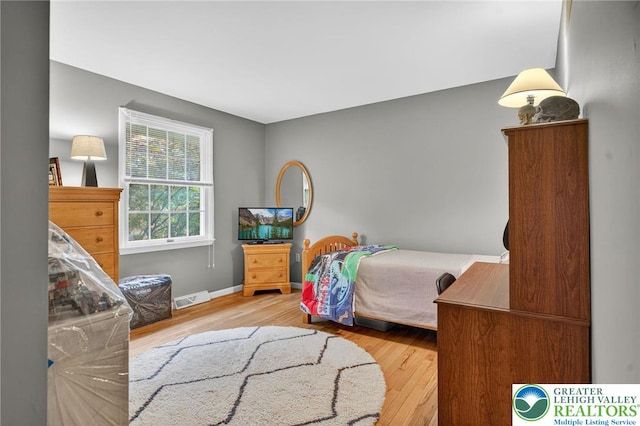 56 Hearthstone Dr, Exeter Twp, PA 19606 - bedroom with wood finished floors and baseboards