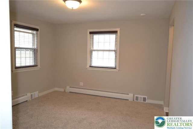1424 Westgate Dr, Hanover Twp, PA 18017 - carpeted empty room with a baseboard heating unit and healthy amount of natural light