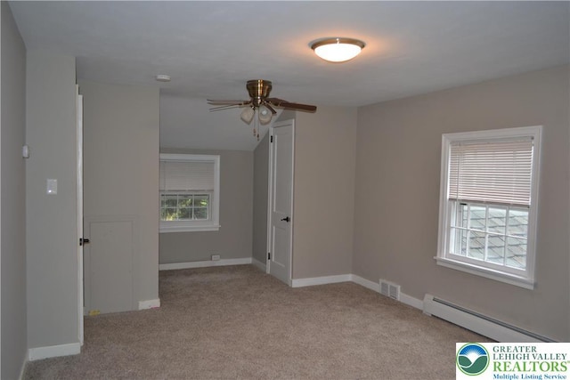1424 Westgate Dr, Hanover Twp, PA 18017 - unfurnished room featuring a baseboard radiator, carpet flooring, a ceiling fan, and vaulted ceiling