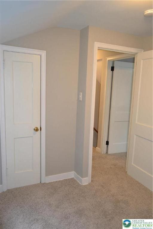 1424 Westgate Dr, Hanover Twp, PA 18017 - unfurnished bedroom with carpet, lofted ceiling, and a closet