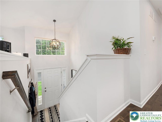 317 Fairview Ave, Wind Gap Boro, PA 18091 - entrance foyer featuring a chandelier, wood finished floors, and stairs
