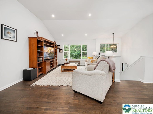 317 Fairview Ave, Wind Gap Boro, PA 18091 - living area with vaulted ceiling, dark wood finished floors, a chandelier, and recessed lighting