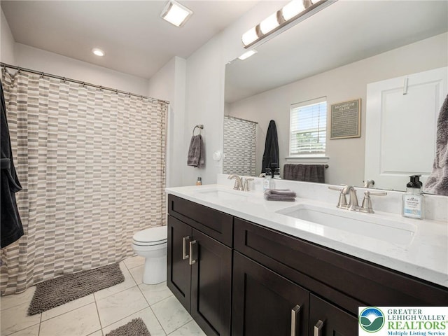 317 Fairview Ave, Wind Gap Boro, PA 18091 - bathroom featuring double vanity, a shower with curtain, and tile patterned floors