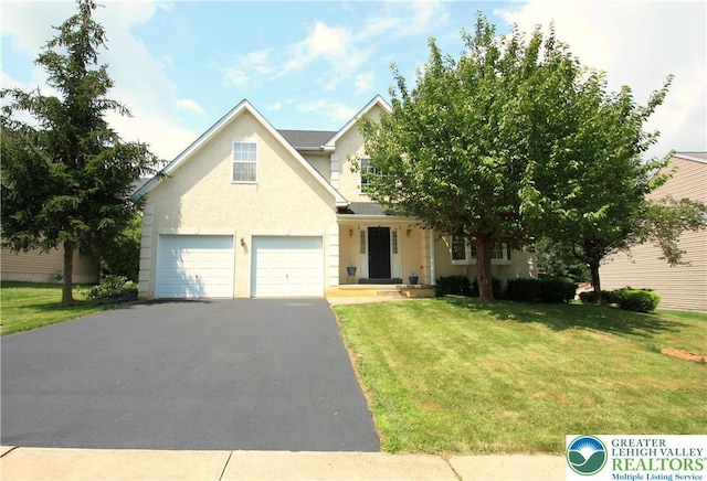 3814 Clay Dr, Lower Macungie Twp, PA 18062 - view of front of property featuring driveway, an attached garage, and a front lawn