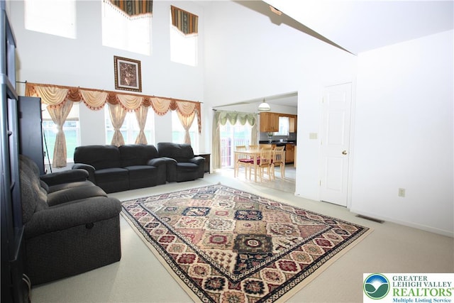 3814 Clay Dr, Lower Macungie Twp, PA 18062 - carpeted living area featuring a high ceiling
