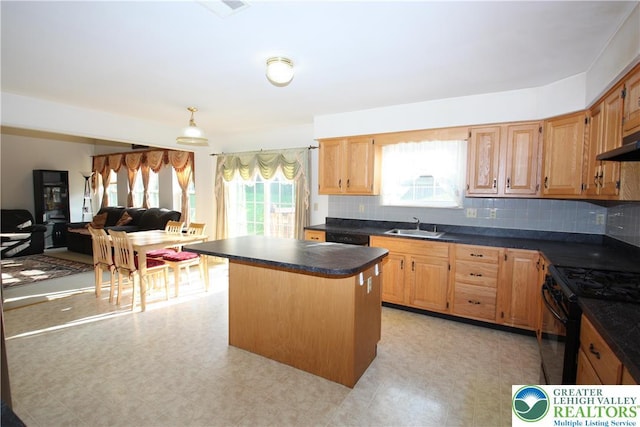 3814 Clay Dr, Lower Macungie Twp, PA 18062 - kitchen featuring dark countertops, black appliances, a center island, backsplash, and open floor plan