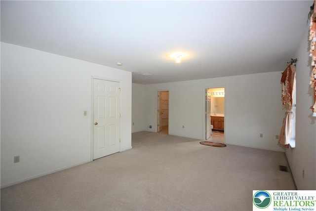 3814 Clay Dr, Lower Macungie Twp, PA 18062 - unfurnished bedroom with light colored carpet and connected bathroom