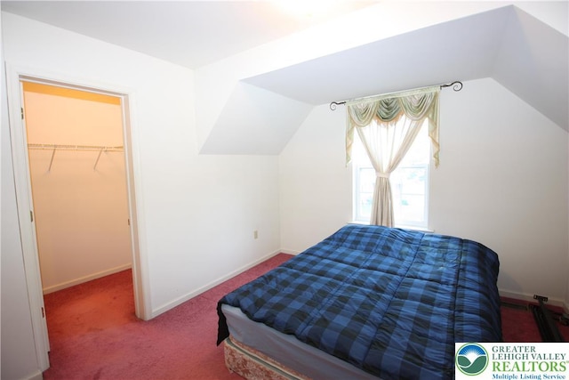 3814 Clay Dr, Lower Macungie Twp, PA 18062 - carpeted bedroom featuring lofted ceiling and a walk in closet